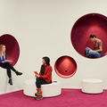 Students sitting and talking in the library